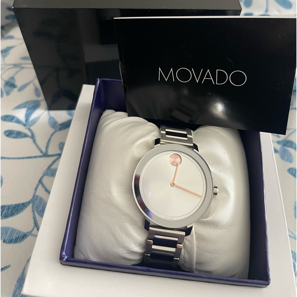 Movado WOMANS watch. Worn once. In PERFECT CONDITION